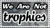 we_are_not_trophies_stamp_by_snakegirlsh